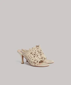 Mules con broderie anglaise
